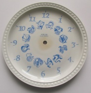 PORCELÁNOVÉ KUCHYŇSKÉ HODINY - TALÍŘ, ZVĚROKRUH