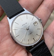 PRIM 68 516 1 so strieborným - sunburst číselníkom