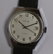 pánské Prim 68, nenošené, pásek Saturn