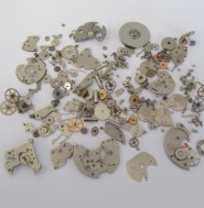 DÍLY NA HODINKY PRIM, NOVÉ NEPOUŽITÉ - VELKÝ MIX SOUČÁSTEK č.1