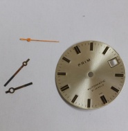 číselník Prim automat + ručky, zlacený