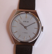 pánské Prim 66, nenošené, pásek Saturn