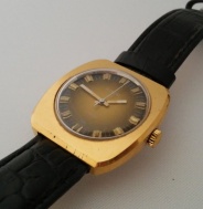 Prim zlacené hnědý ciferník  hranaté na koženém řemínku