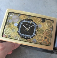 Originální černý opasek s číselníkem Prim Televize, bronzová spona z hodinek
