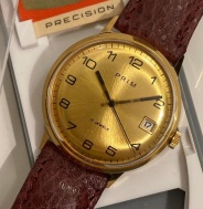Prim Elegant Zlatý Sunburst datum + krabička