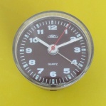 Zajímavý budík Quartz - menší válec