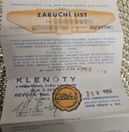 2 záruční listy na staré kalibry