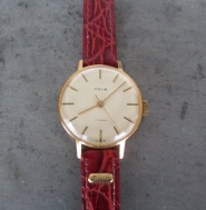 Hodinky Prim 28mm ve zlaceném pouzdře - model 66 424 3 z roku 1981