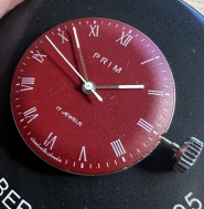 Prim cal. 66 - strojček s číselníkom