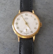 Hodinky Prim 30mm ve zlaceném pouzdře