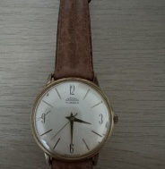 Hodinky PRIM, zlacené s věnováním