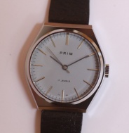 pánské Prim 66, nenošené, pásek Saturn