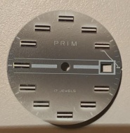 Šedý číselník Prim