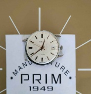 Hodinky Prim - strojek + číselník + 2x pouzdro.