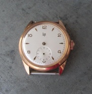 LIP - velmi pěkné náramkové pánské hodinky ve zlaceném pouzdře