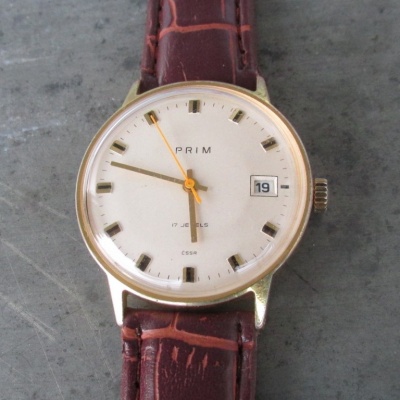 Hodinky PRIM ve zlaceném pouzdře - typ 68 440 3 z roku 1981
