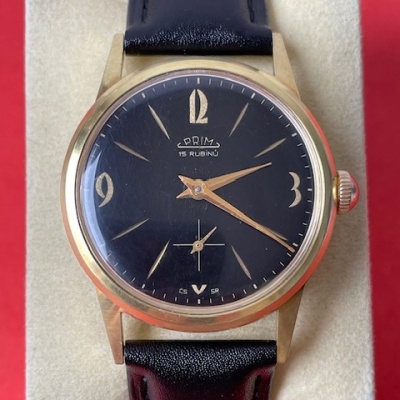 Prim 15rubinu šviajčiarske pozl.puzdro