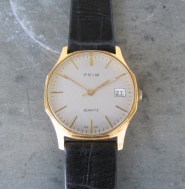 Hodinky Prim Quartz ve zlaceném pouzdře - typ 210 079 3