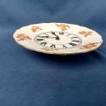Nástěnné porcelánové hodiny Prim Electronic
