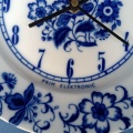 Nástěnné porcelánové hodiny Prim Electronic