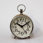 budík Prim B 71, jako nový, funkční, oranžový, malý